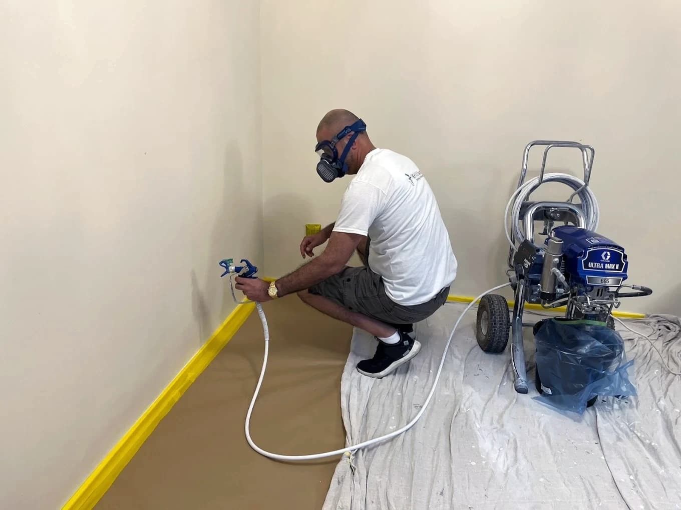 Professional painter from Brilliant Painting applying finish in Manchester